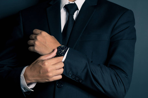 Businessman Fixing Cufflinks his Suit - Photo, Image