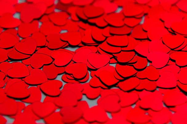 Valentines day background of red hearts confetti. - Zdjęcie, obraz