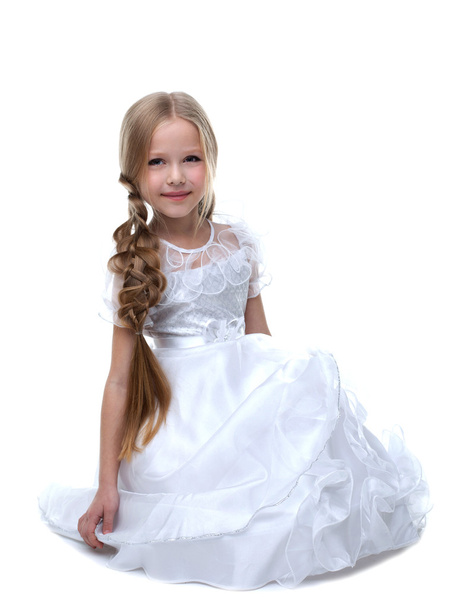 Pretty blonde kid portrait in white dress isolated - Фото, изображение