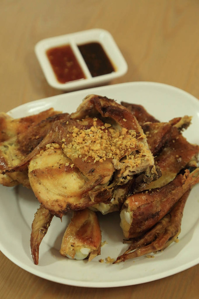 Grilled chicken with crispy garlic, Thai style street food recip - Photo, image