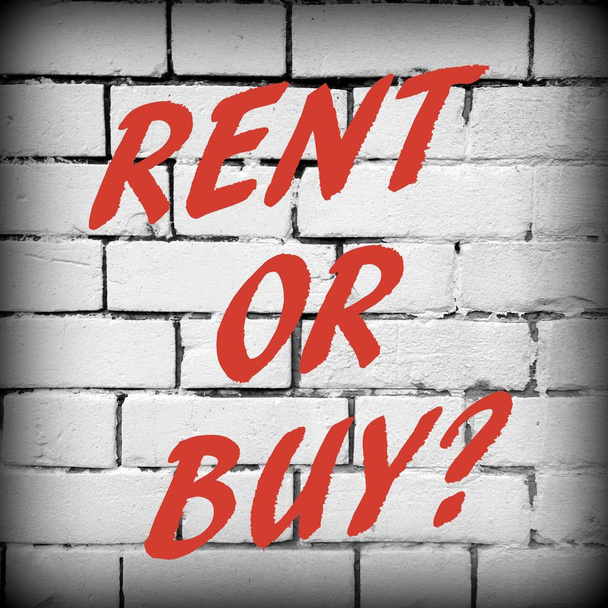 Rent Or Buy Question Written on a Wall - Фото, изображение
