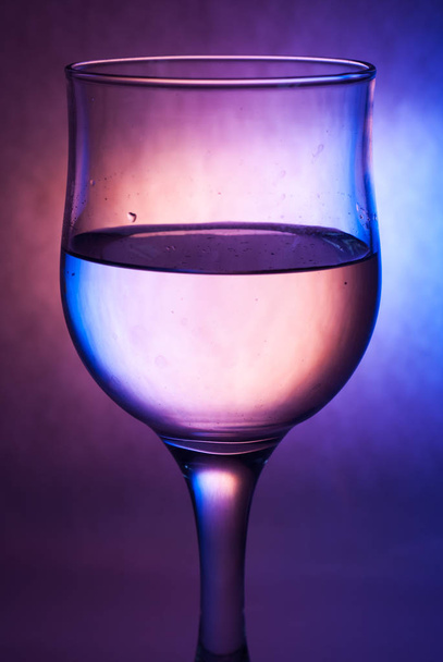A glass of water on a cool background, - Photo, Image
