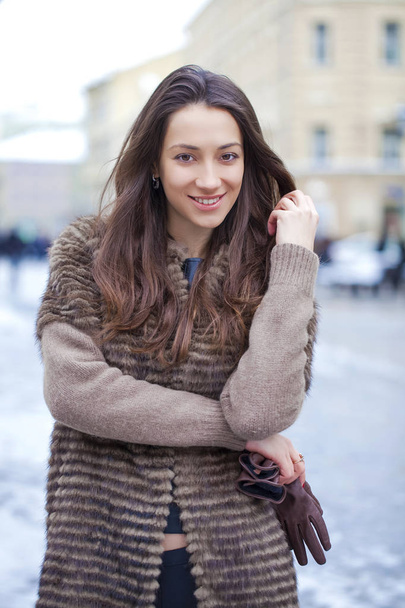 Young beautiful woman in stylish mink coat  - Photo, Image