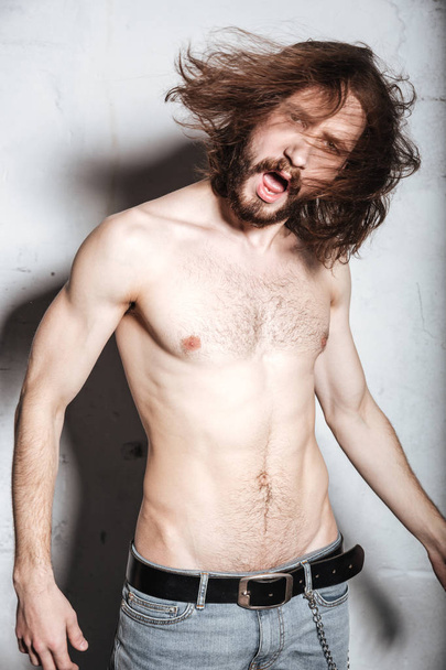 Screaming emotional young bearded hipster man - Fotoğraf, Görsel