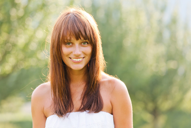 Summer portrait of young smiling woman - Photo, Image