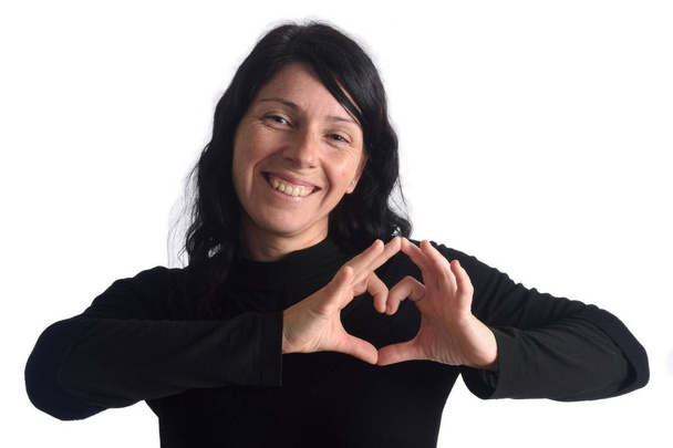 Woman with heart sign - Photo, Image