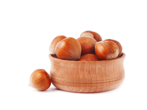 Hazelnut in a wooden bowl isolated  - Photo, Image