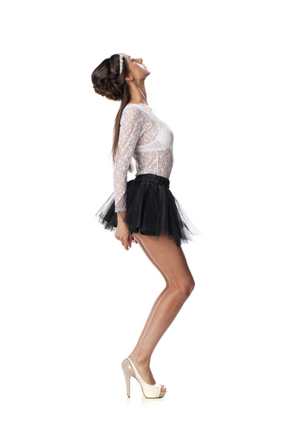 Portrait of a beautiful slim model in black skirt and white blou - Fotografie, Obrázek