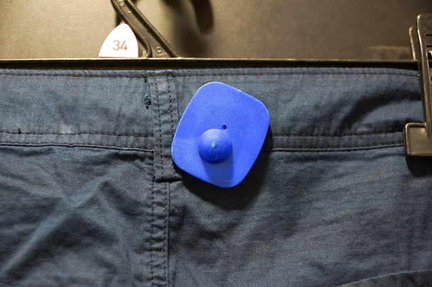 Жесткая RFID-метка для одежды
 - Фото, изображение