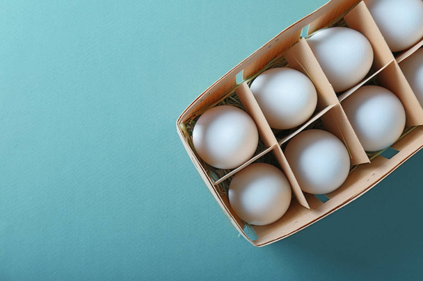 Raw eggs in package  - Valokuva, kuva