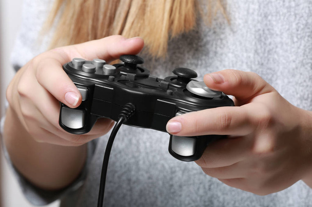 teenager playing videogame - Photo, Image