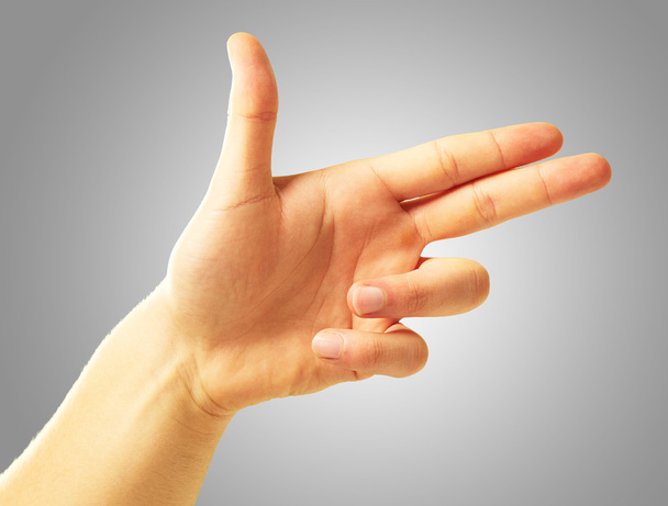 ludzką ręką wskazując z dwoma palcami - Zdjęcie, obraz