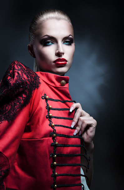 erotic blonde woman in red jacket with red lips - Fotoğraf, Görsel