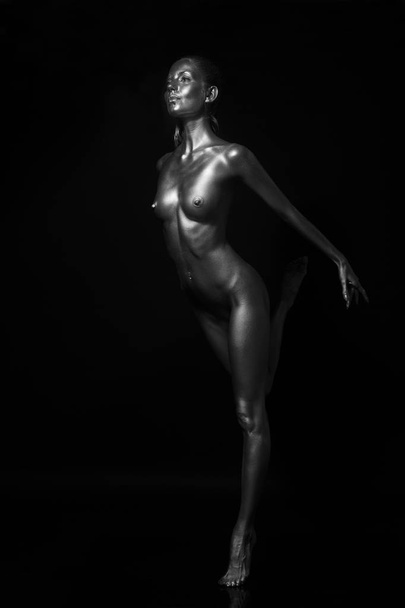 naked body in a silver body painting - Photo, Image