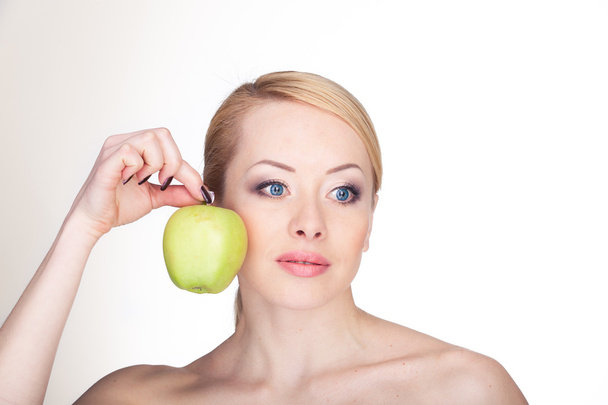 woman with apple - Valokuva, kuva