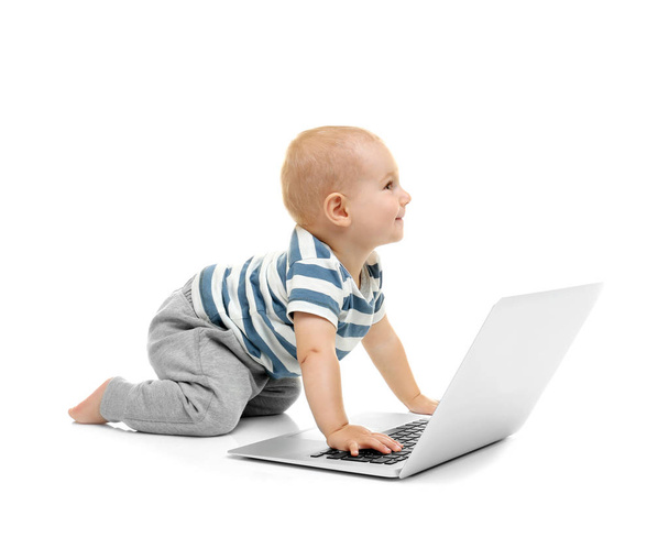 Cute baby boy with laptop - Фото, изображение