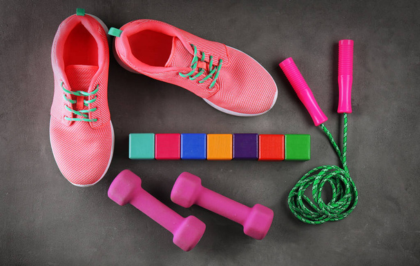 Sneakers, skipping rope and cubes - Fotografie, Obrázek