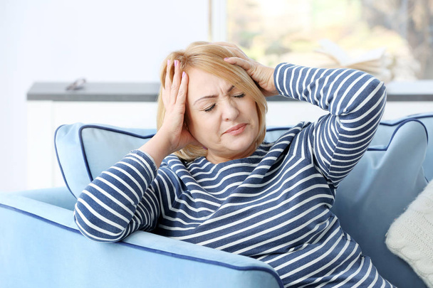 Senior woman suffering from headache   - Фото, зображення