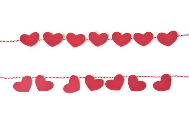 Herz-Ammern-Papier geschnitten auf weißem Hintergrund  - Foto, Bild