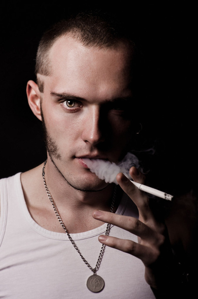 young guy smoking a cigarette - Foto, Imagem
