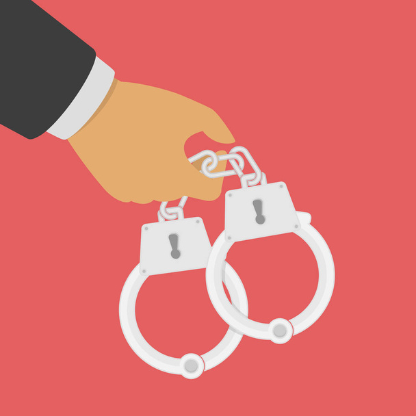 Handcuffs in his hands. - Vector, Image