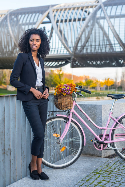 Business black woman with vintage bicycle  - Photo, Image
