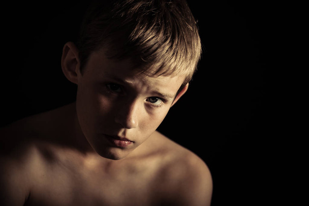 Portrait of a serious looking boy - Photo, Image