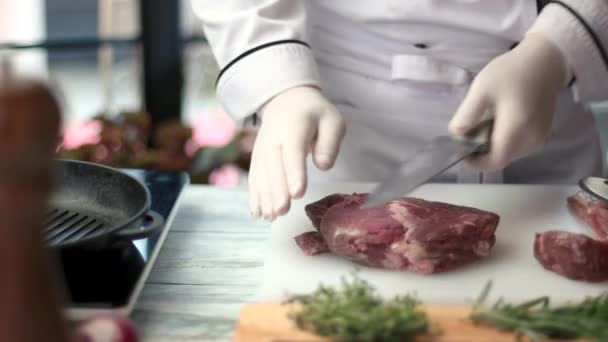 Meat and knife in hands. - Footage, Video