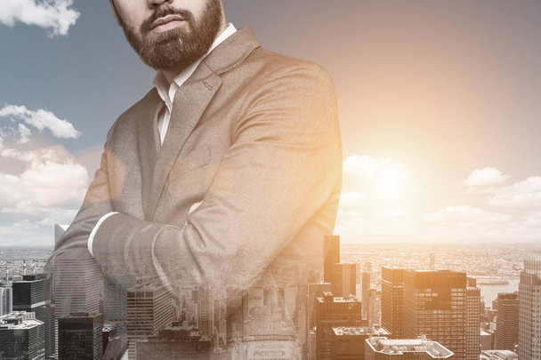 Bearded man on city background - Фото, изображение