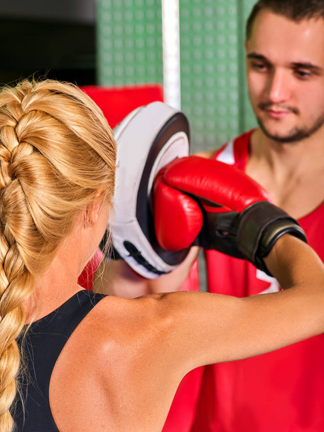 Boxing workout woman in fitness class. Sport exercise two people. - Photo, Image