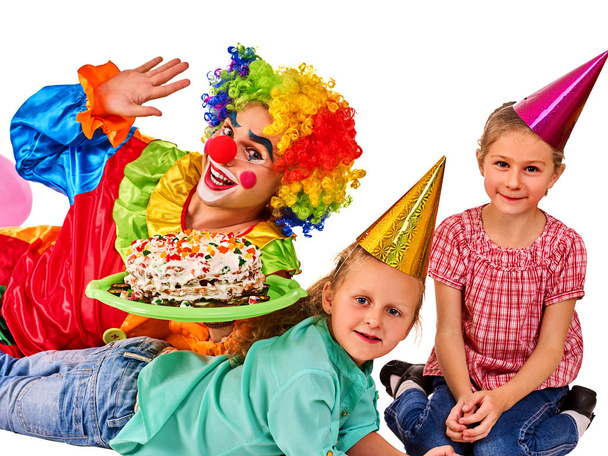Birthday child clown playing with children. Kid cakes celebratory. - Photo, Image