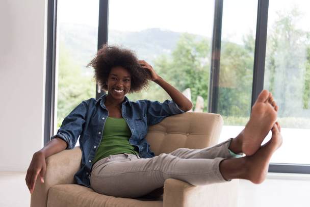 black women at home in the chair - Photo, Image