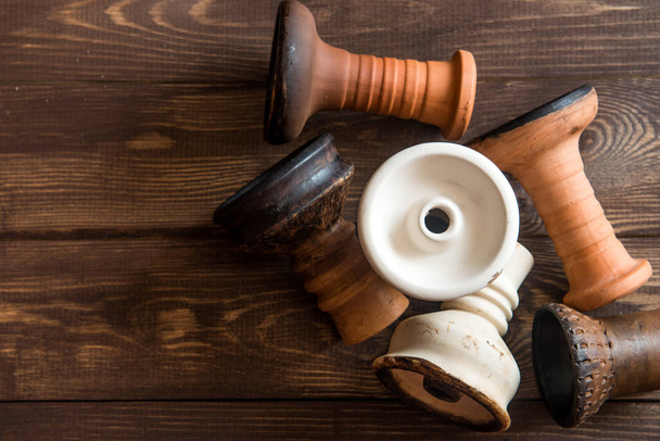  Hookah bowl on wooden table - Fotografie, Obrázek