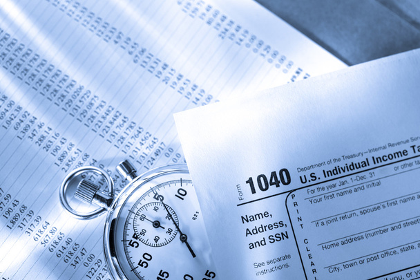 daňový formulář, provozní rozpočet a stopky - Fotografie, Obrázek
