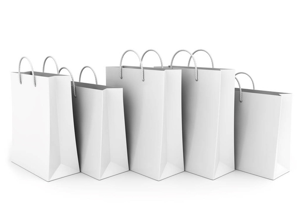 Sacos de compras vazios no branco. Em uma linha
 - Foto, Imagem