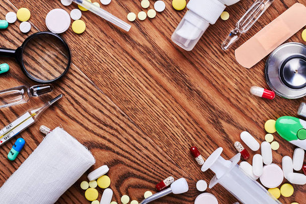 Medicines and tools on wood. - Foto, Imagen