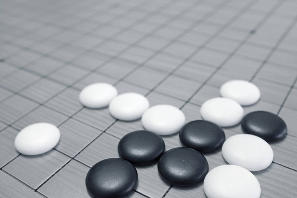 Go game or Weiqi (Chinese board game) background - Photo, Image