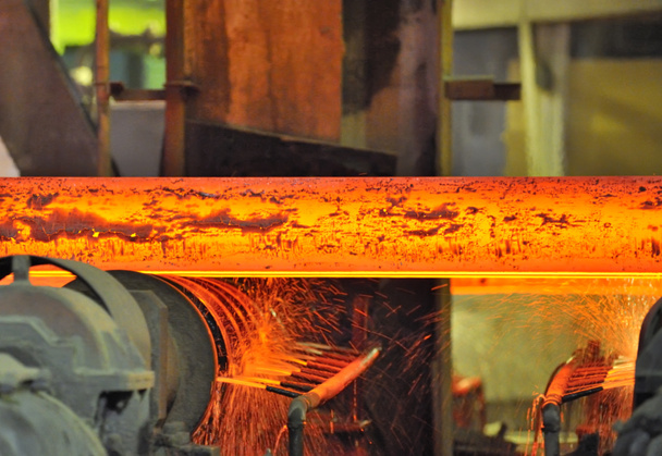 Hot steel on conveyor - Photo, Image