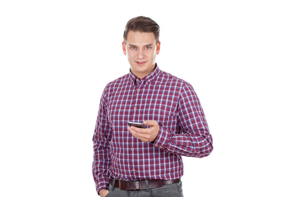 Young man with smartphone - Fotó, kép
