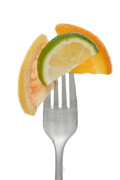 fork with citrus - Foto, afbeelding
