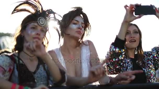 Female taking picture at festival - Footage, Video