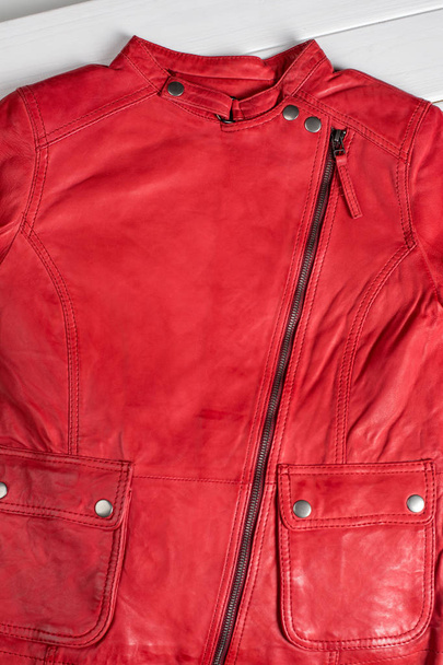 Red  leather jacket. Leather jacket macro details. - Zdjęcie, obraz