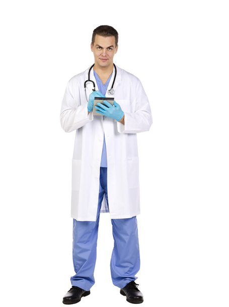 Front view of a doctor making notes - Photo, Image