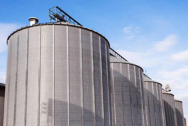 Agricultural silos on blue sky. - Photo, Image