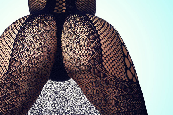Female buttocks in black lingerie - Фото, зображення