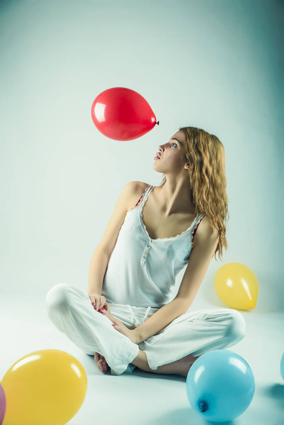Beautiful girl with balloons - Фото, зображення