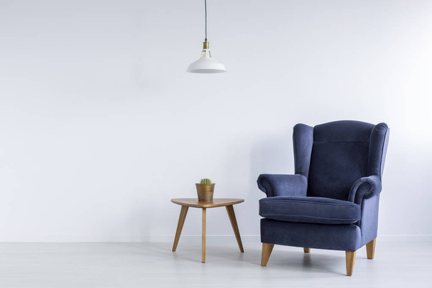 Bright interior with blue armchair - Фото, зображення