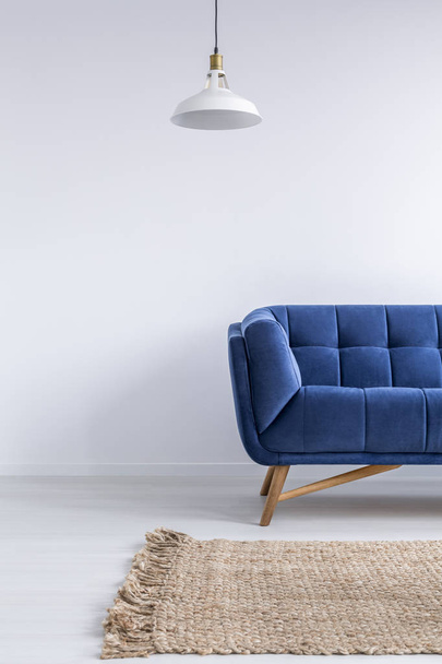 Home interior with blue sofa - Foto, afbeelding