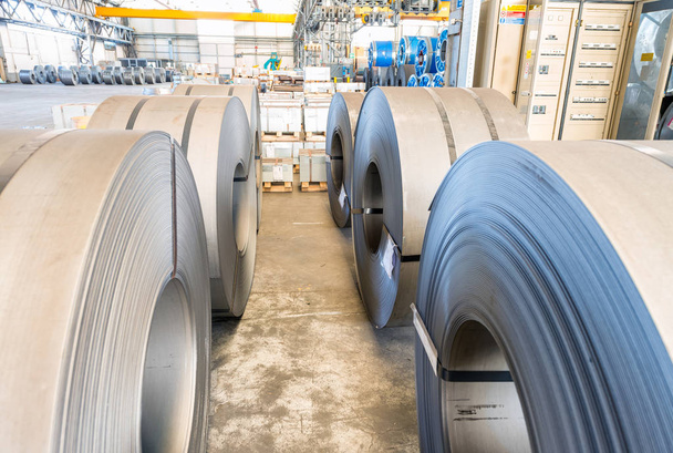 Metail coils stacked in a company warehouse - Photo, Image