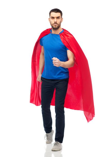 man in red superhero cape - Valokuva, kuva